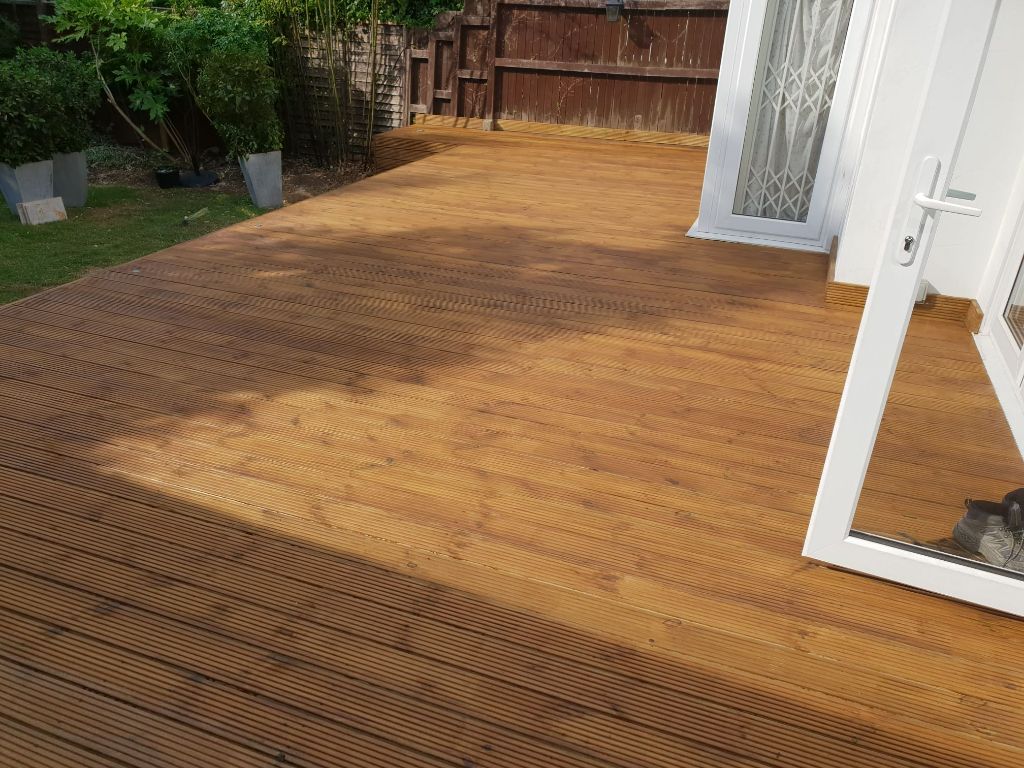 Finished timber decking with french doors